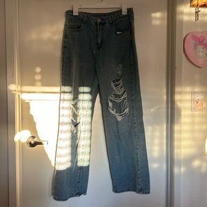 Light blue waste fitting jeans baggy on the bottom